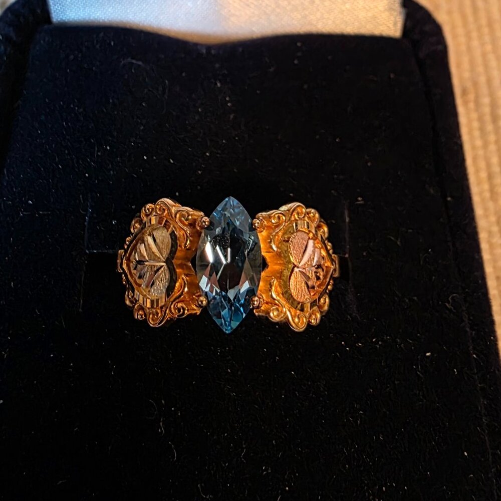 Avon Black Hills Gold Genuine Blue Topaz Ring